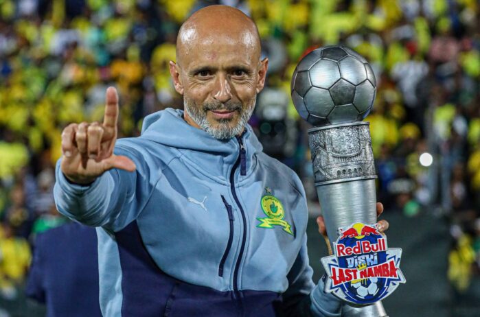 Mamelodi Sundowns coach Miguel Cardoso celebrates with the RedBull Diski Last Namba trophy