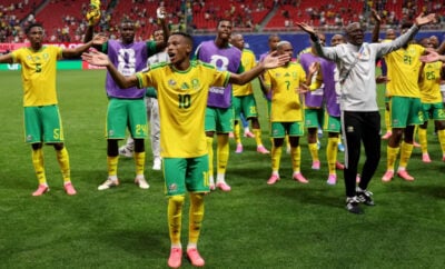 Relebohile Mofokeng leads Bafana Bafana players in celebrating the 1-0 win over South Korea