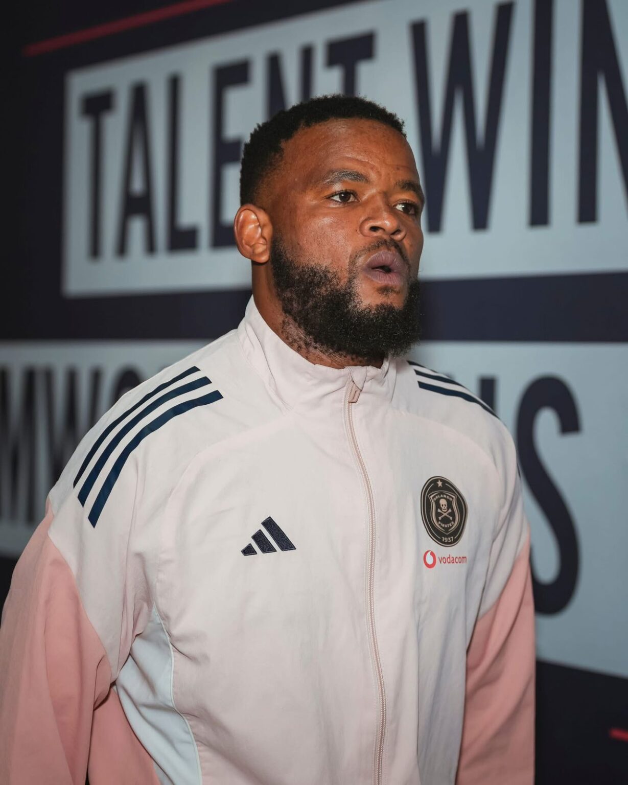 Sipho Mbule at Orlando Pirates walking to the pitch