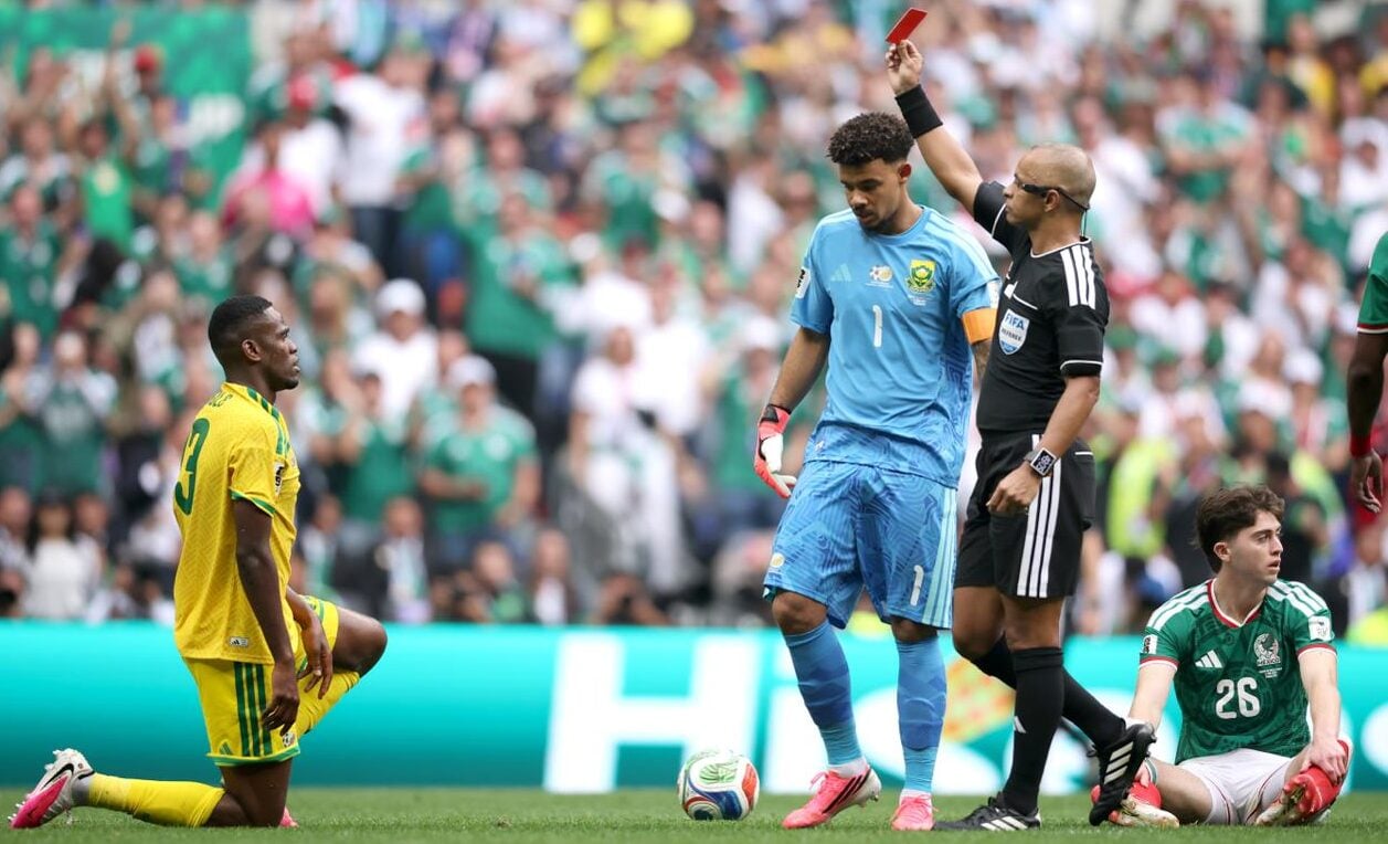 Sphephelo Sithole receives his marching orders against Mexico, leaving captain Ronwen Williams to watch on