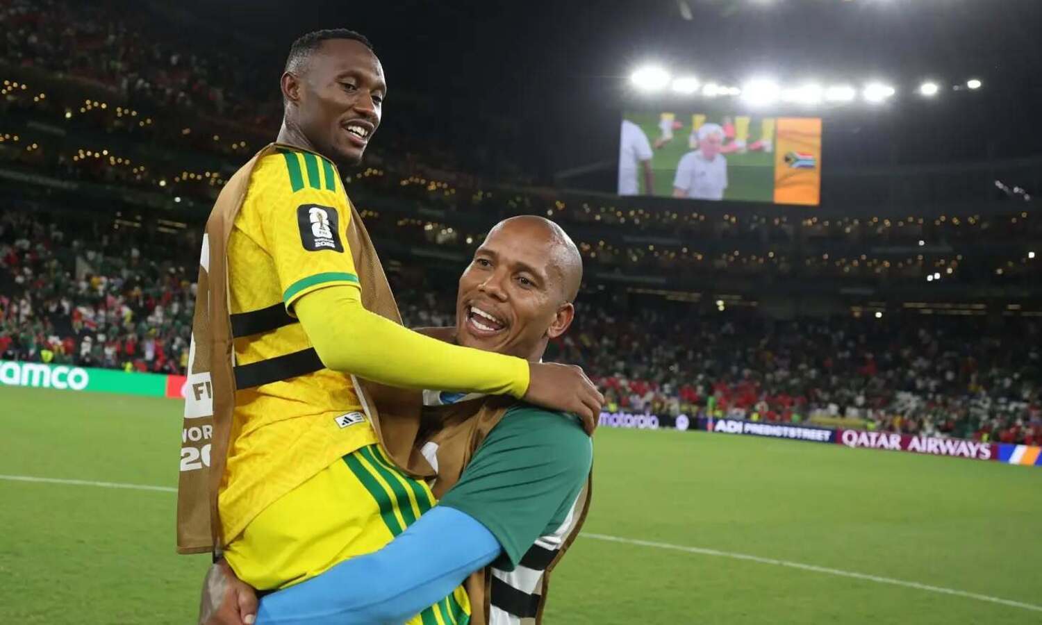 Thapelo Maseko and Ricardo Goss celebrating Bafana Bafana beating South Korea
