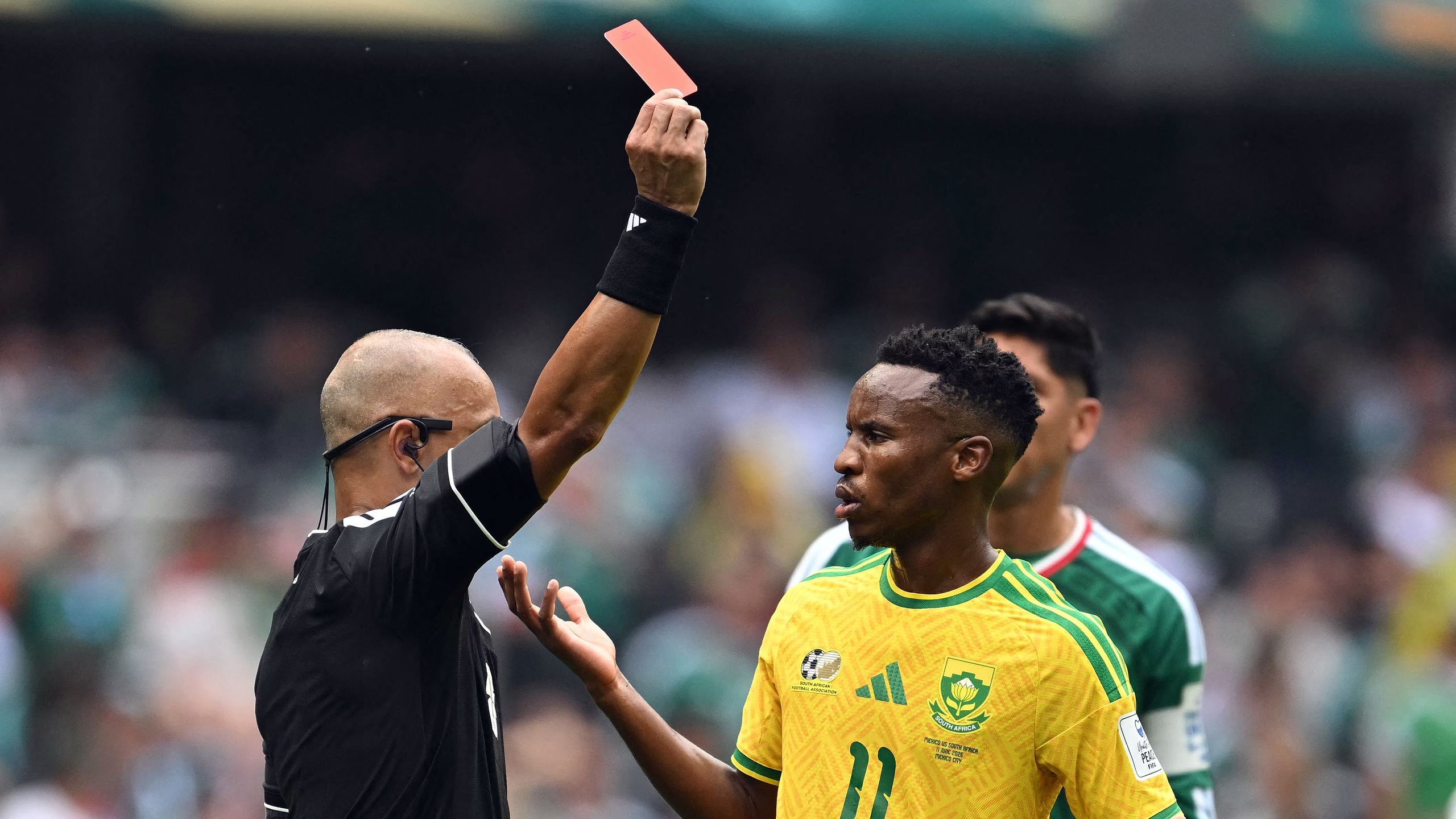 How many matches will Yaya Sithole and Themba Zwane miss after red cards?