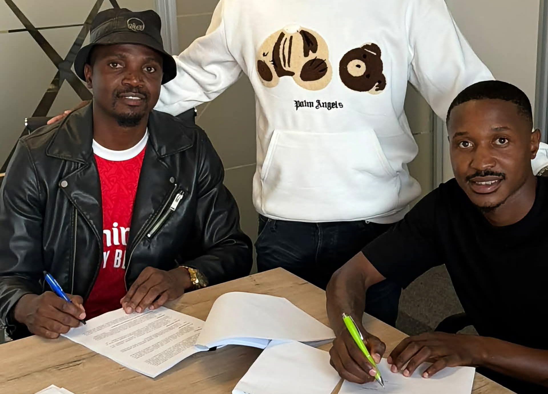 Tshepo Rikhotso and Sibusiso Ncube and signing their new contracts with Marumo Gallants