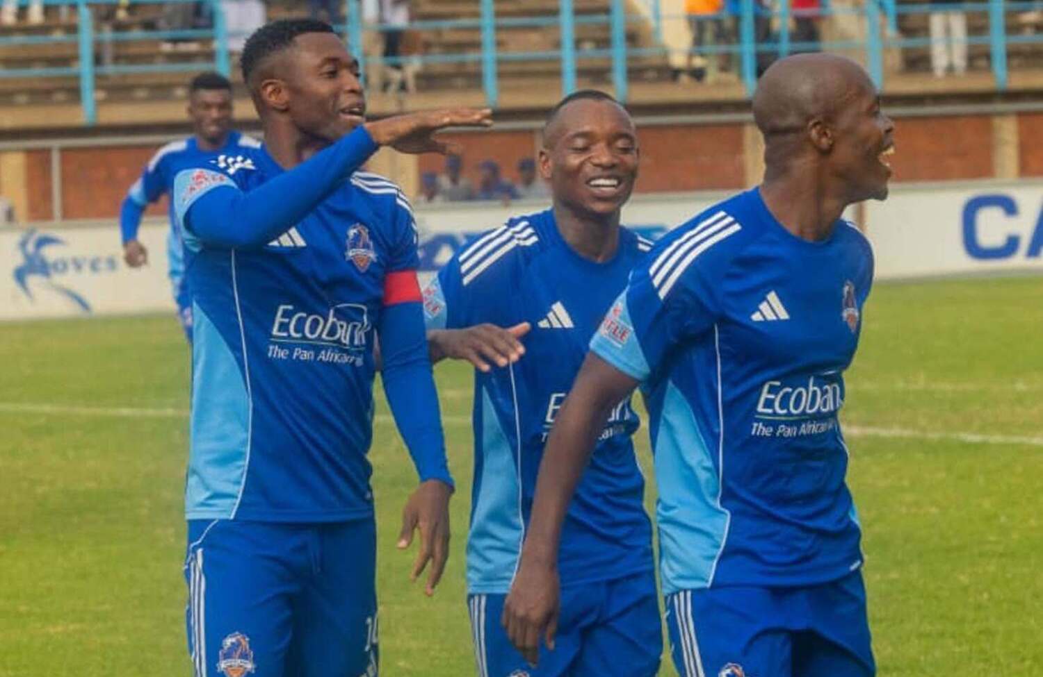 Walter Musona, Khama Billiat and Knowledge Musona celebrating the latter's goal for Scottland FC