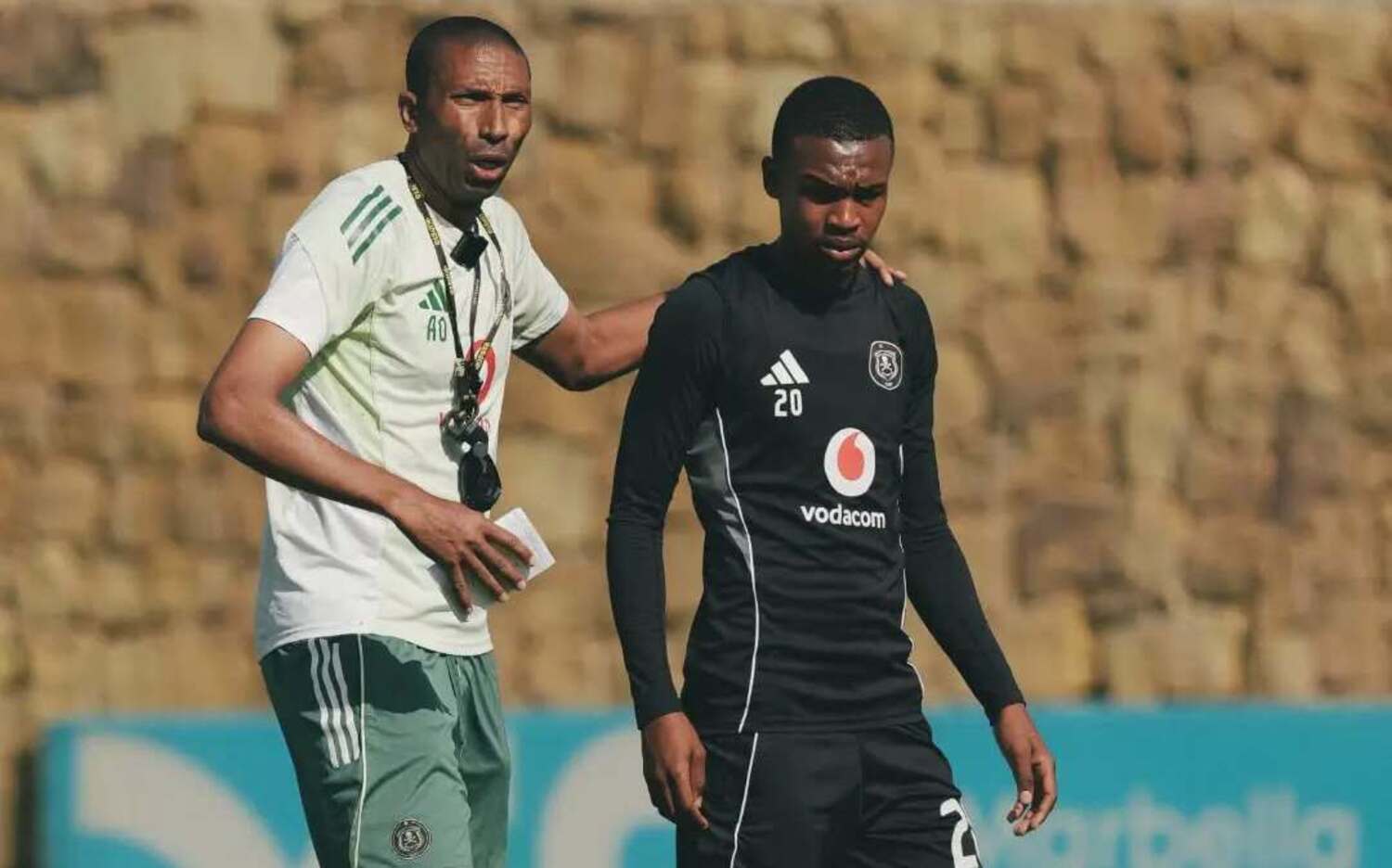 Abdeslam Ouaddou with Orlando Pirates youngster Simphiwe Selepe at training