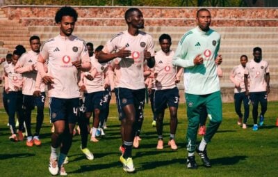 Christian Derbyshire jogs alongside Tapelo Xoki and Abdeslam Ouaddou