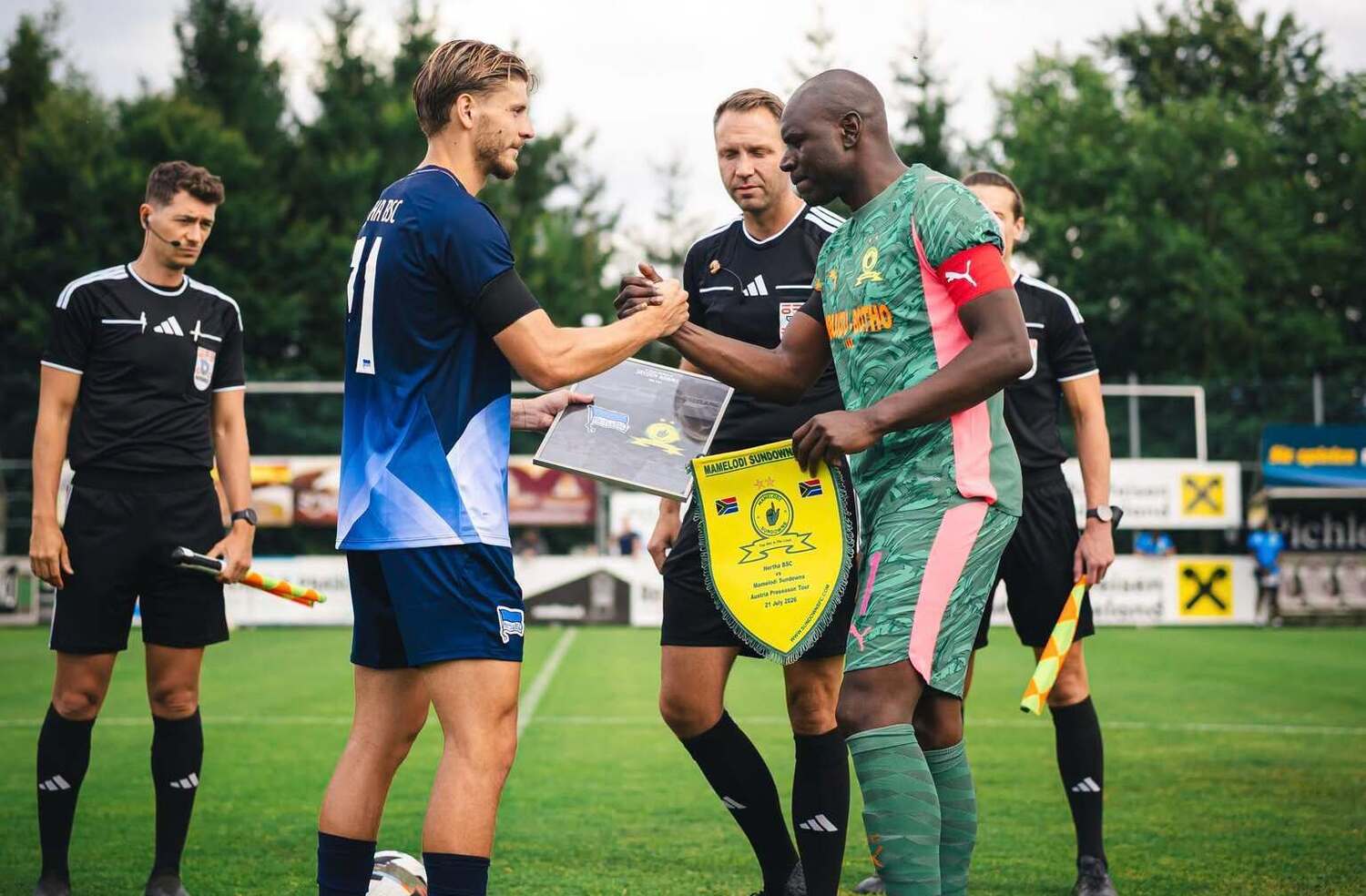 Denis Onyango with the Hertha Berlin captain before the two teams' friendly match