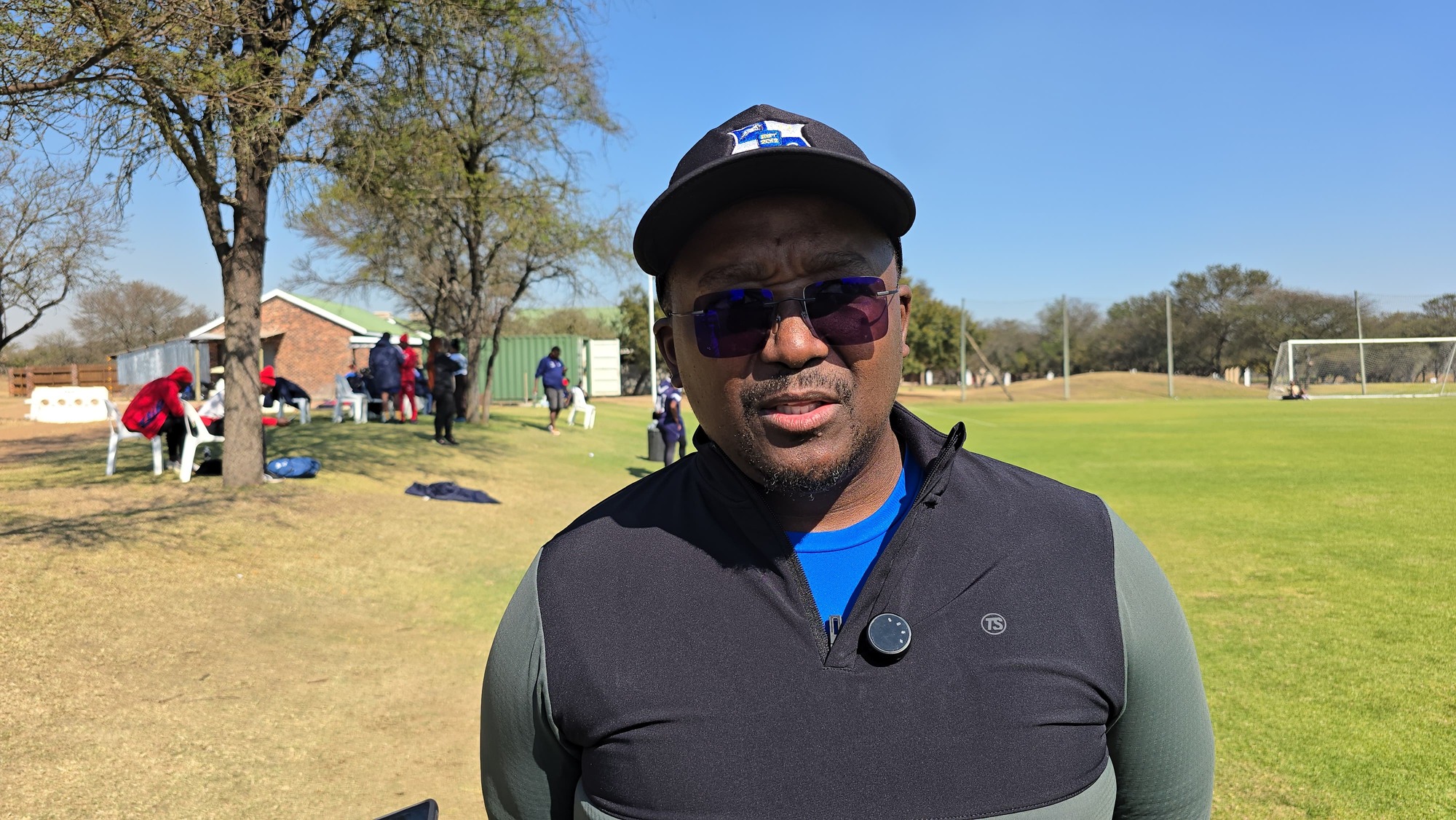 Dr Xanti Pupuma conducting an interview during a pre-season camp in Polokwane.