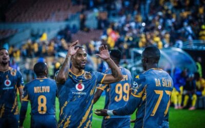 Inacio Miguel celebrating with scorer of Kaizer Chiefs' goal Flavio da Silva