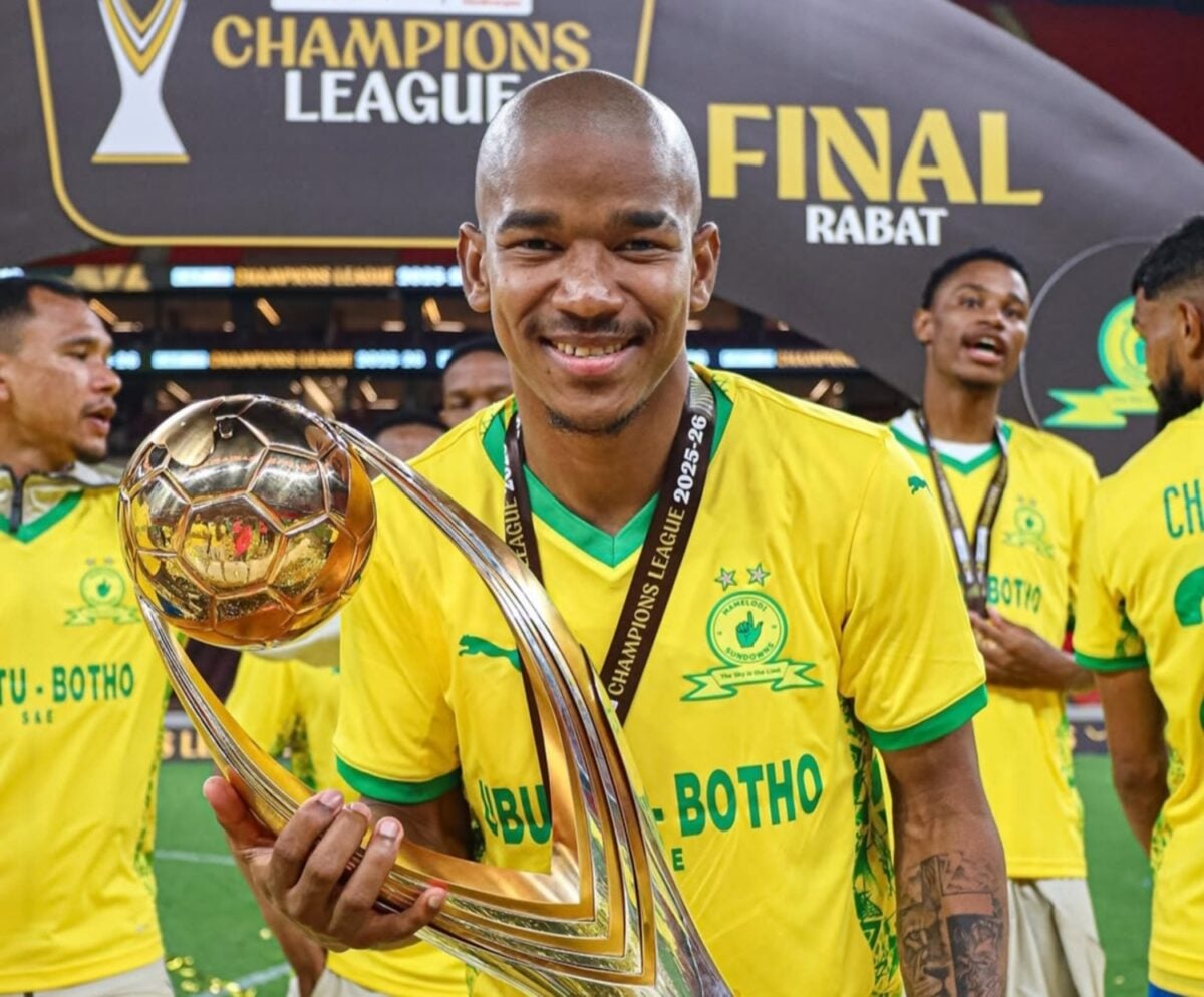 Jayden Adams holding a CAF Champions League trophy with Mamelodi Sundowns