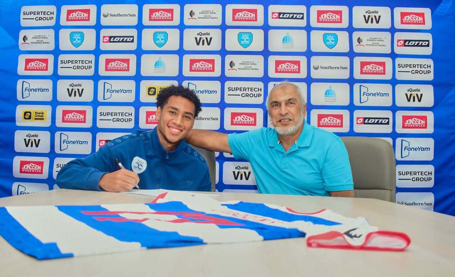 Kyle Jurgens at the announcement of his long-term deal with Durban City chairman Farook Kadodia