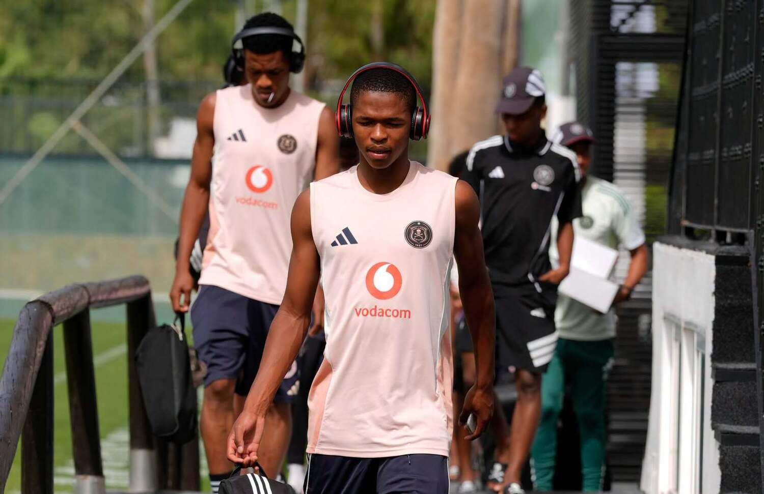 Mpho Padime and Mthetheleli Mthiyane walking to the training session with Orlando Pirates