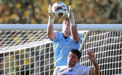Nathan Garrow saving the ball while in action for Auckland City