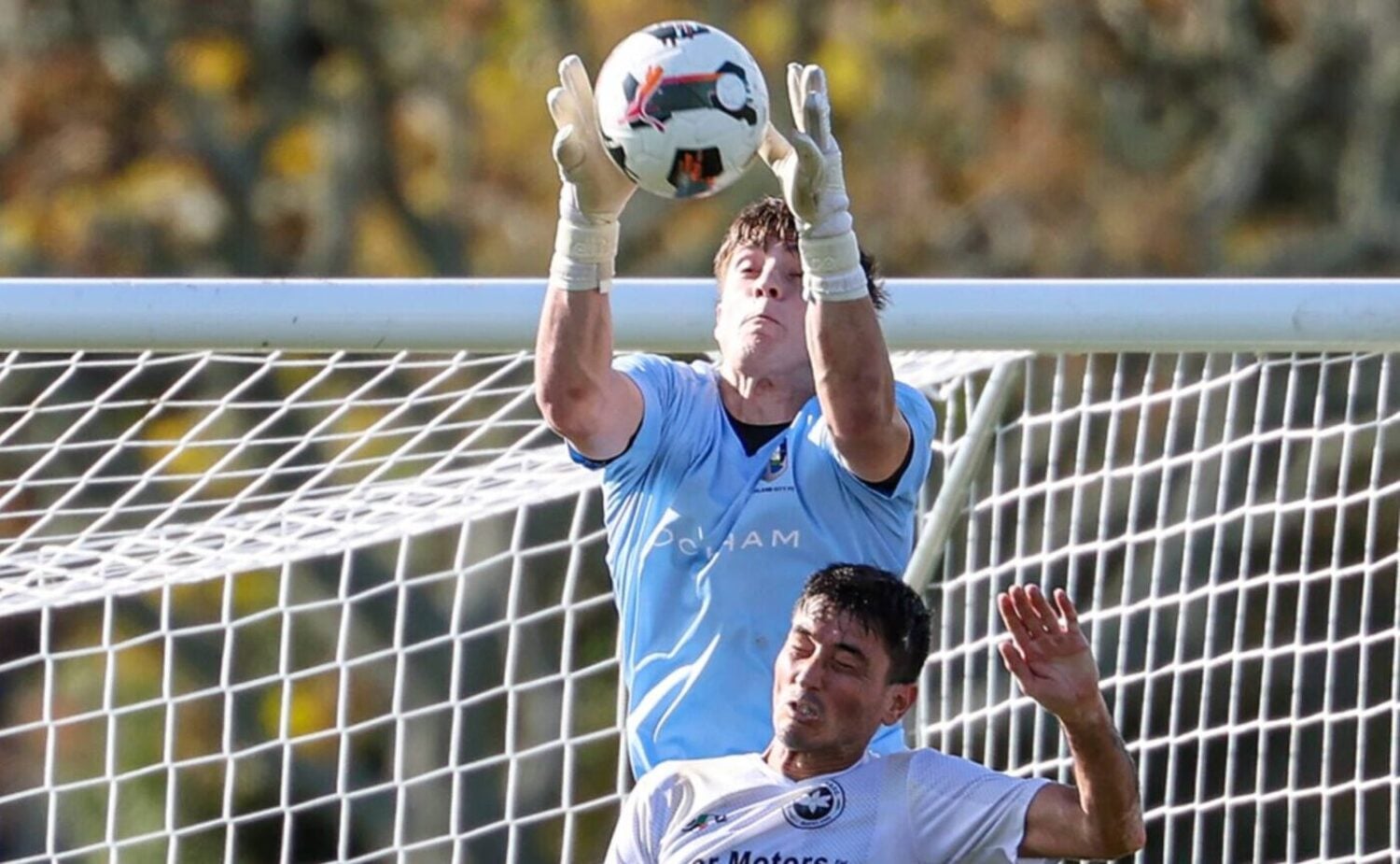 Nathan Garrow saving the ball while in action for Auckland City