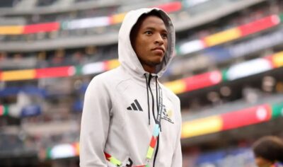 Relebohile Mofokeng walking during a pitch inspection at the 2026 FIFA World Cup