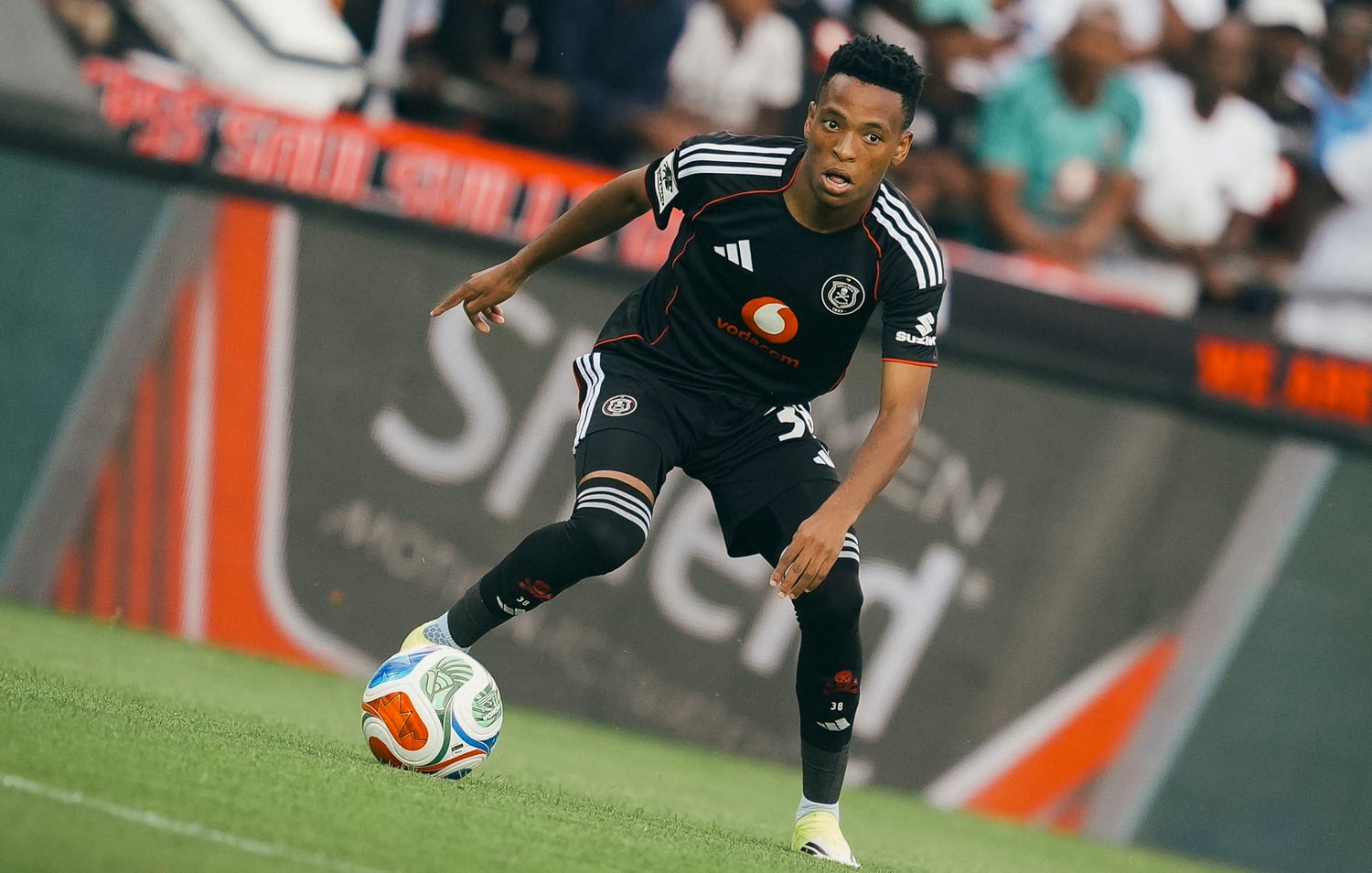 Relebohile Mofokeng dribbling trhe ball in action for Orlando Pirates