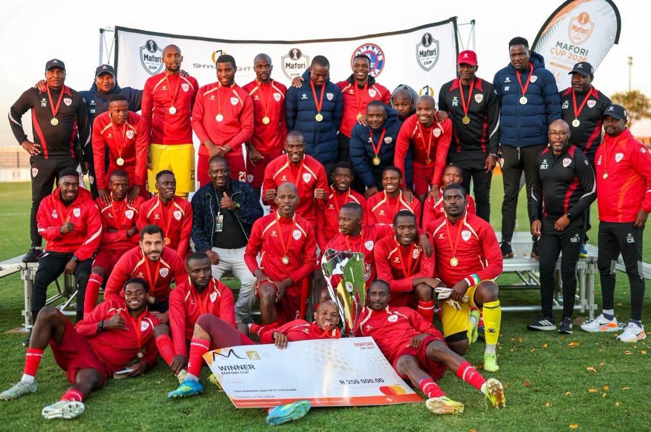 Sekhukhune United players and staff celebrate winning the Mafori Cup in Seshego.