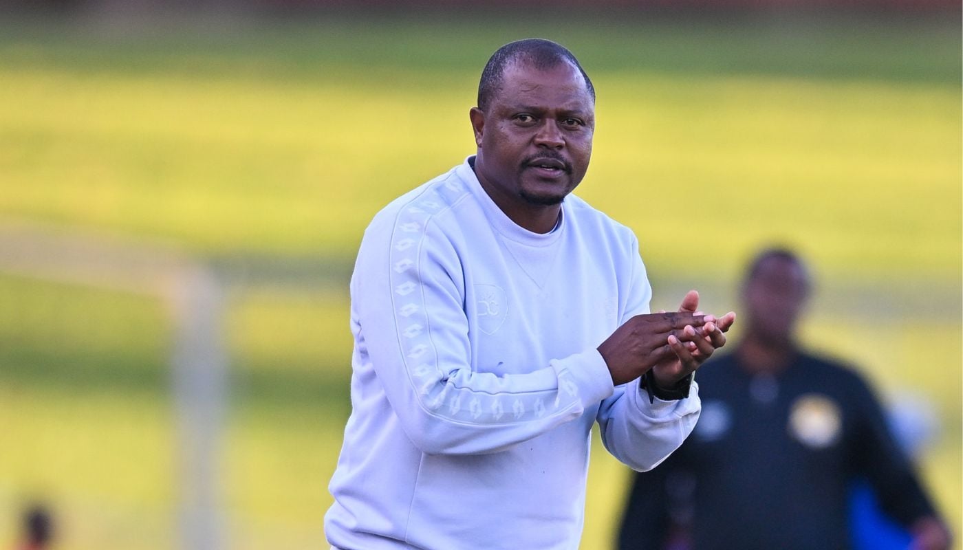 Simo Dladla on the touchline giving instructions to his players
