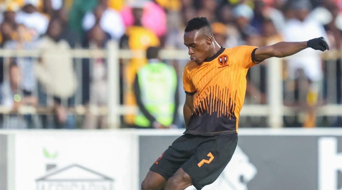 Simon Ramabu kicking a ball during a League match with Polokwane City