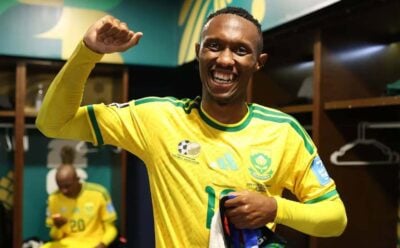Thapelo Maseko celebrating in the dressing room after Bafana Bafana beat South Korea