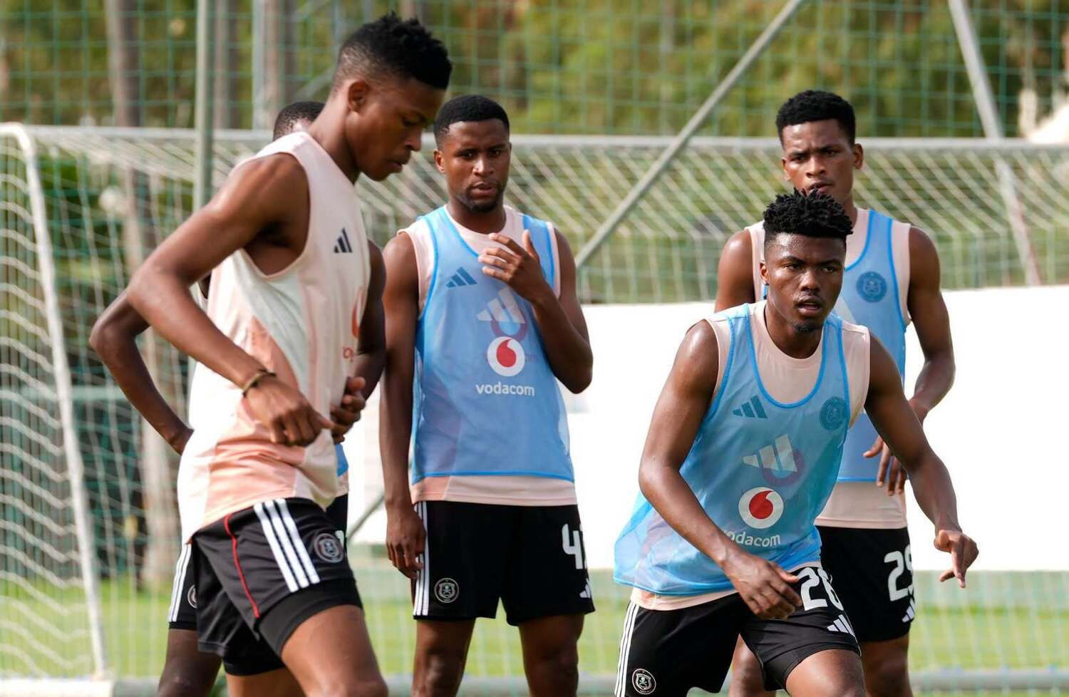 Yanela Mbuthuma with the ball at an Orlando Pirates training session