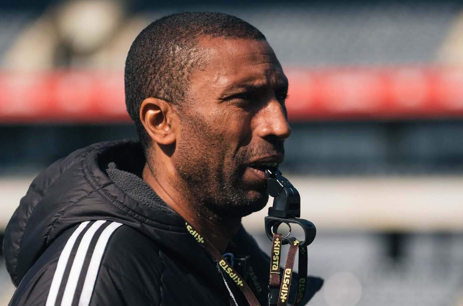 Abdeslam Ouaddou with a whistle during training with Orlando Pirates
