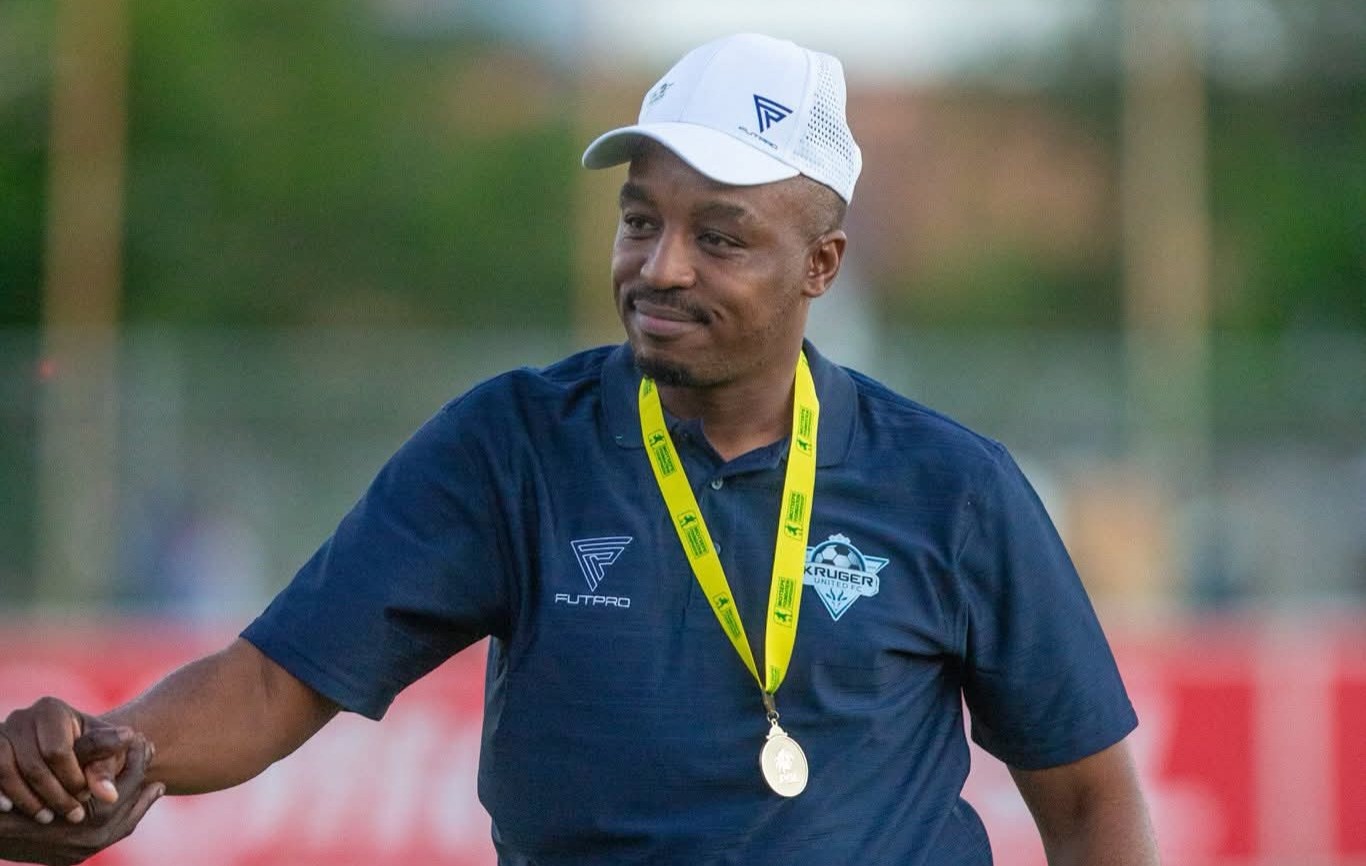 Abraham Mongoya celebrating the promotion to the elite League with Kruger United.