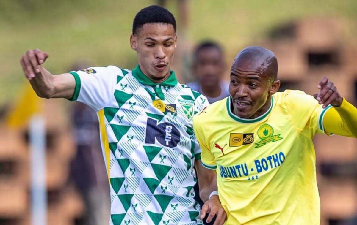 Golden Arrows FC's Ronaldo van Neel challenges Mamelodi Sundowns defender Thapelo Morena