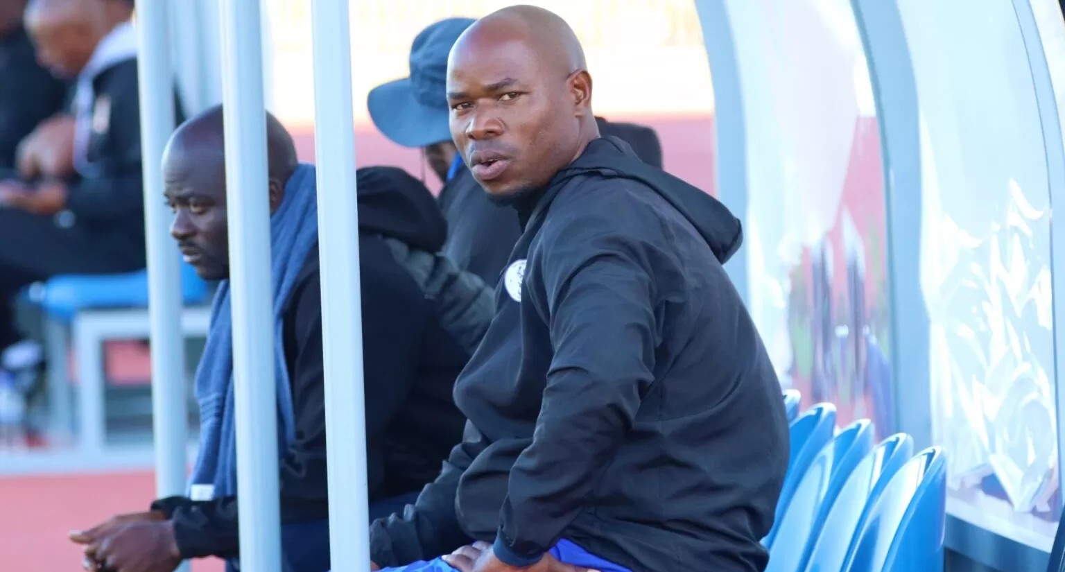 Collins Mbesuma sitting on the bench during his time at Pretoria Callies