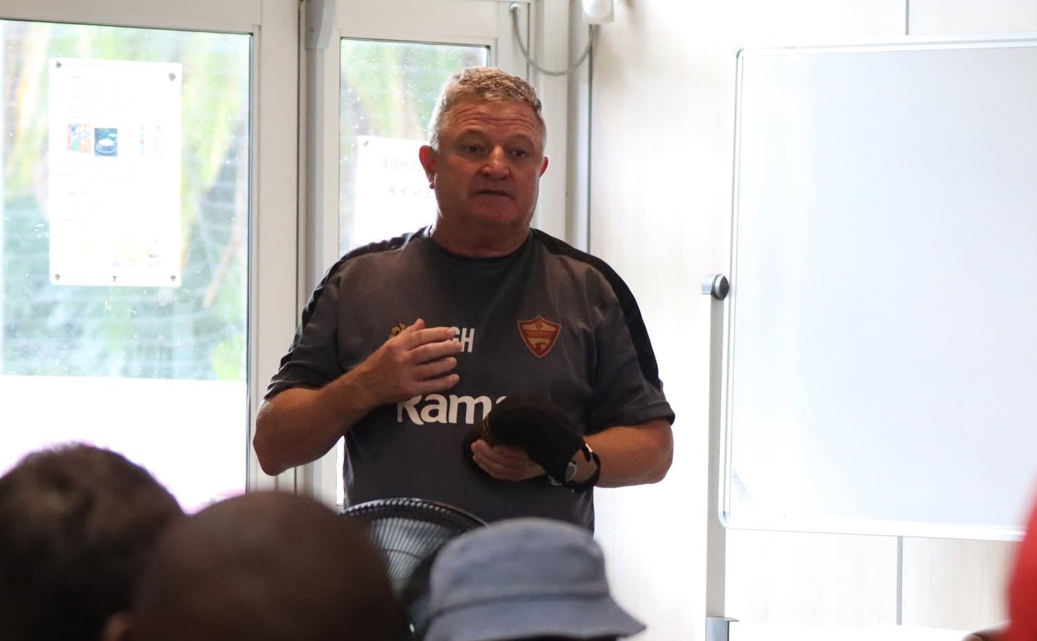 Gavin Hunt having a team talk with his Stellenbosch FC players