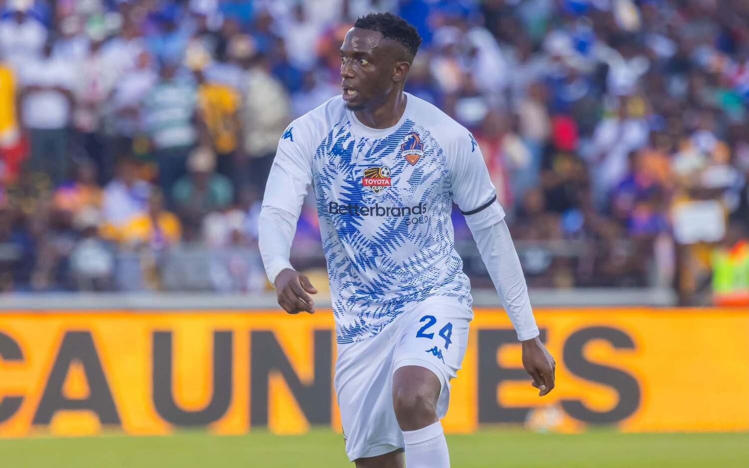 Former Chippa United defender Kelvin Moyo in action for Scottland FC against Kaizer Chiefs in the Toyota Cup