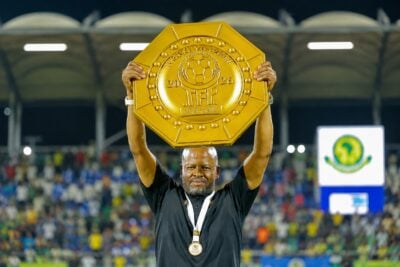 Manqoba Mngqithi lifting the Community Shield trophy