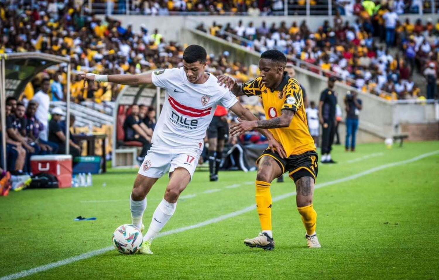 Kaizer Chiefs winger Pule Mmodi tries to stop a Zamalek SC player