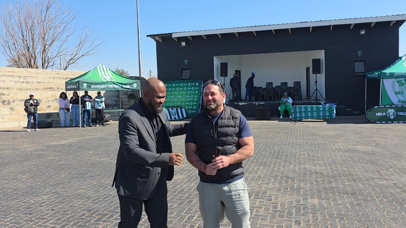 Siwelele FC chairman Cavin le John with Kevin Musikanth, executive manager of the Cheetahs, at the Bochabela Boxing Arena in Bloemfontein.