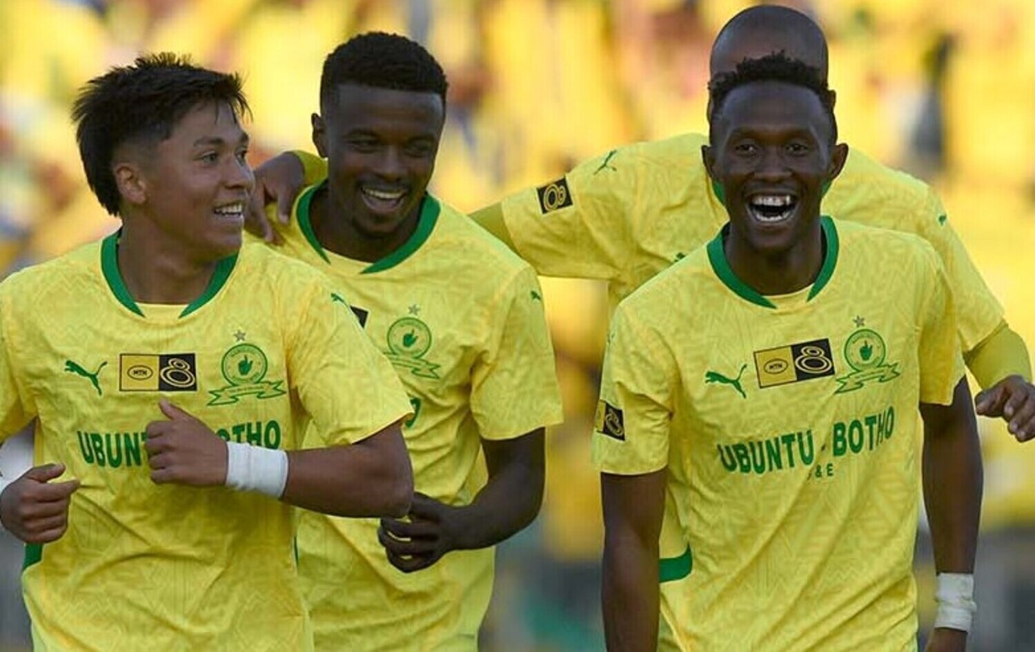 Thapelo Maseko celebrating with Mamelodi Sundowns teammates