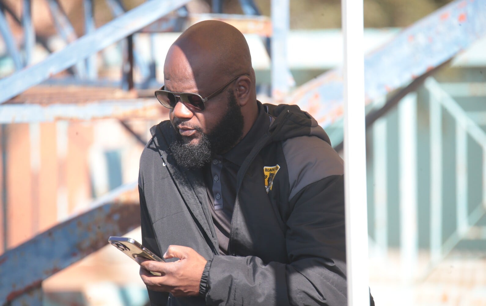Tshifhiwa โChiefโ Thidiela looking at his phone during a Black Leopards training.