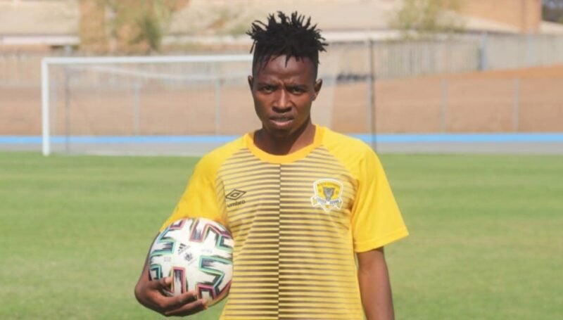 Wanga Khorommbi holding the ball wearing Black Leopards colours