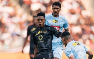 Orlando Pirates striker Yanela Mbuthuma trying to dribble past Gaston Sirino