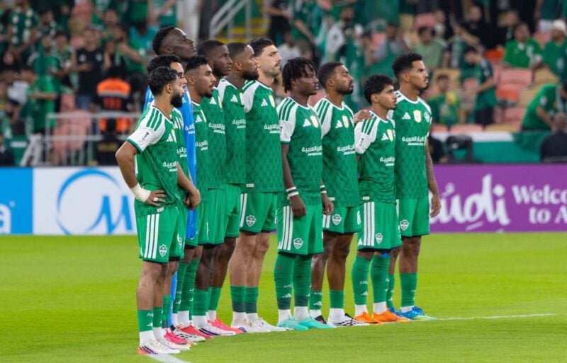 Al Ahli players line up before a match