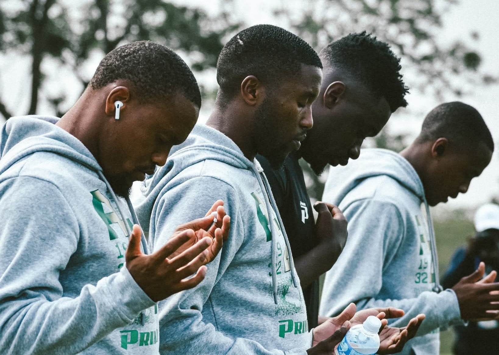 AmaZulu FC players praying before a League match.
