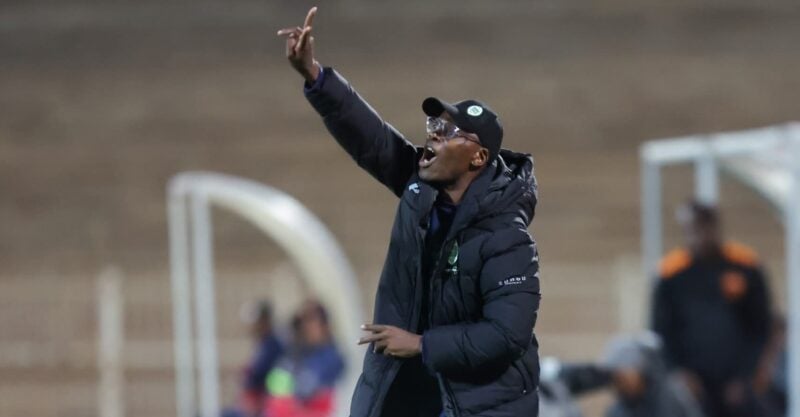 AmaZulu FC coach Arthur Zwane giving instructions on the bench during a League match.