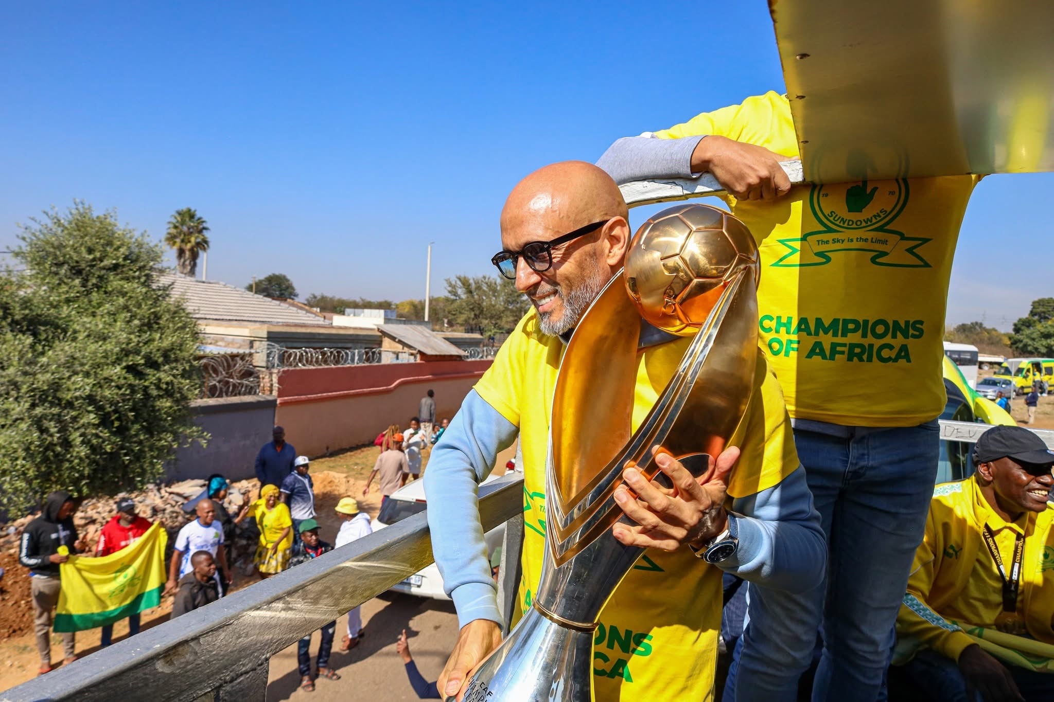 Miguel Cardoso lifts the CAF Champions League trophy.