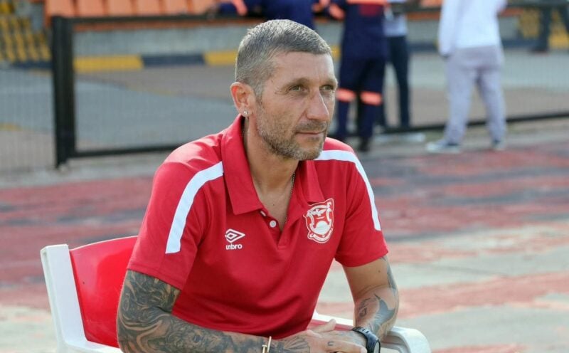 Dimitar Nikolaev Pantev sitting on the bench during a match with Gaborone United.