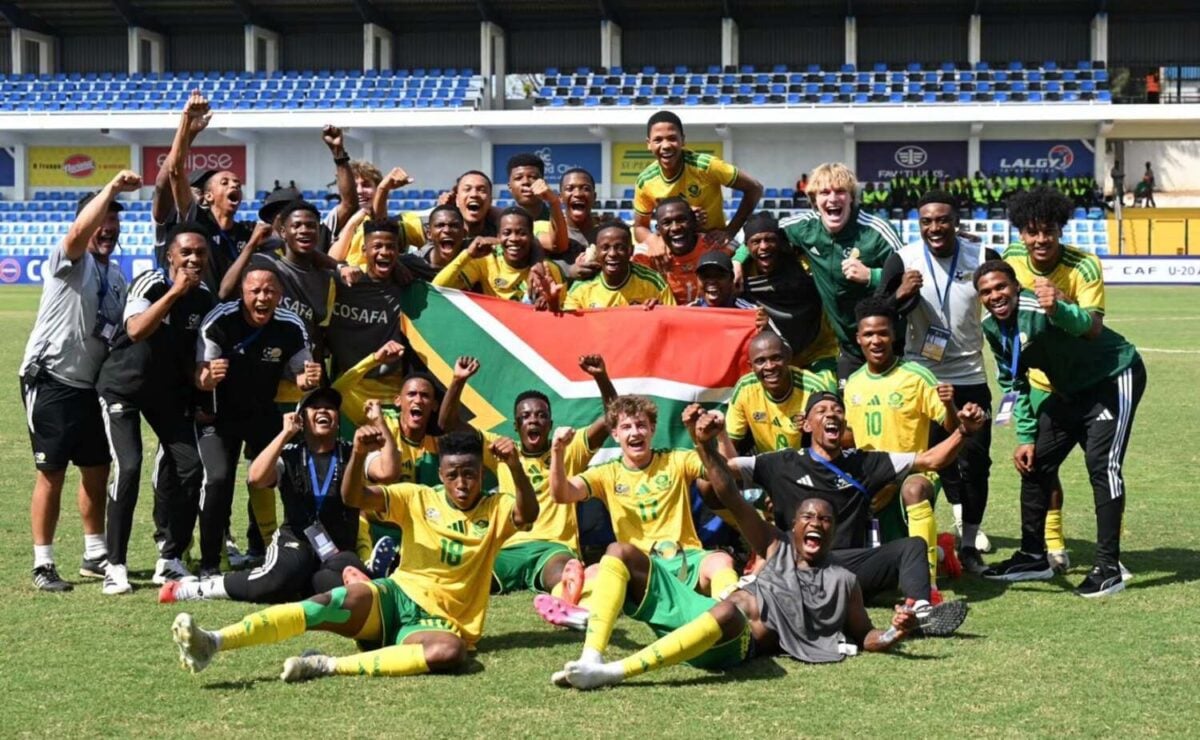 Emile Witbooi [shirt number 10] celebrating with his Amajita teammates