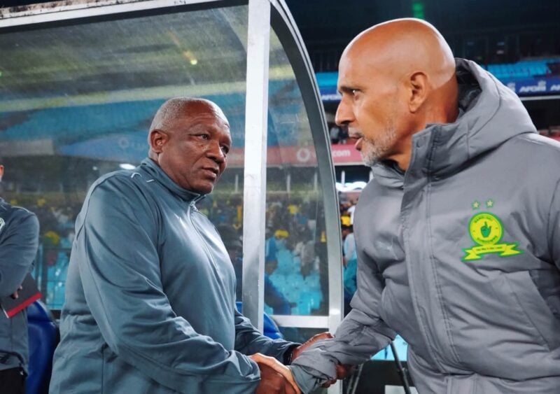 Godfrey Mosoetsa and Miguel Cardoso shaking hands before a match at Loftus.