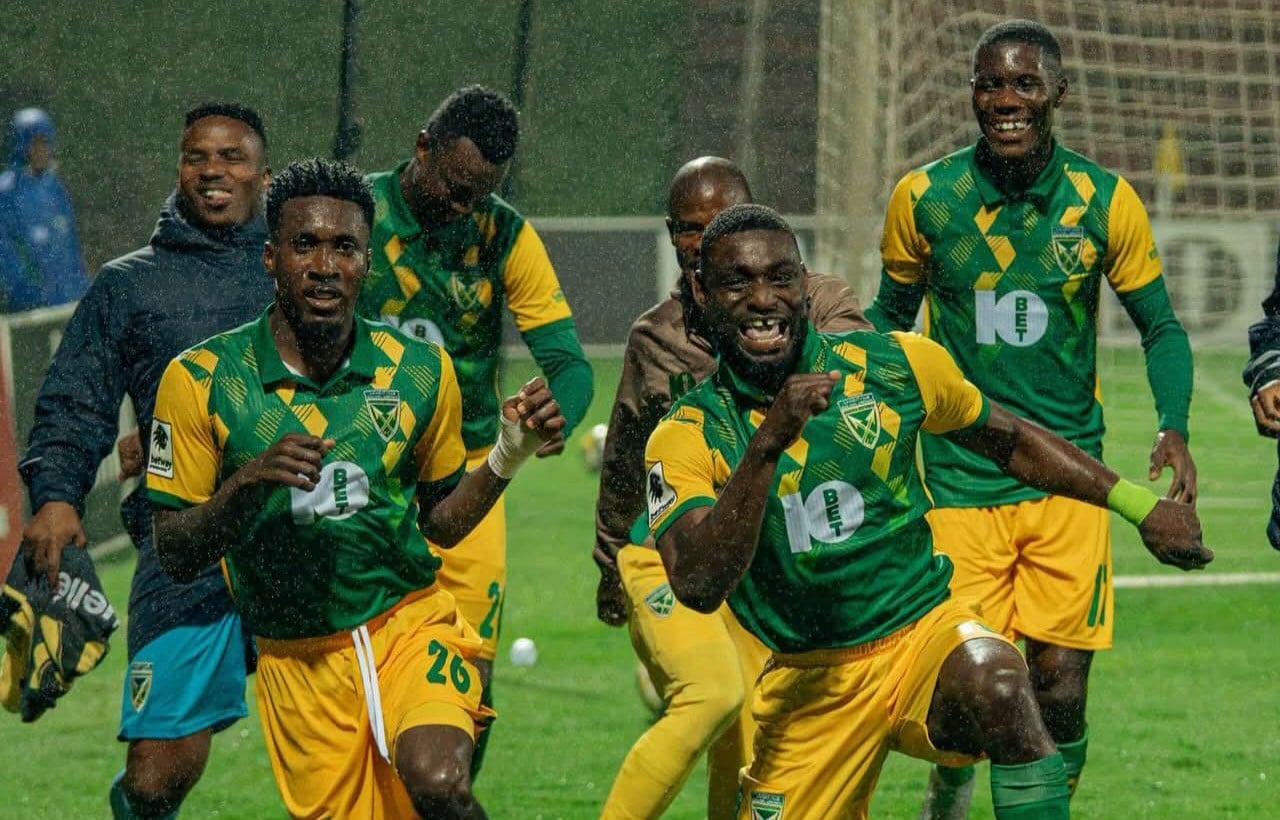 Junior Dion celebrate a goal with his Golden Arrows teammates