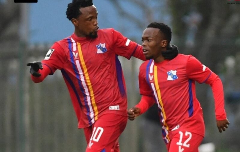 Milford FC players celebrating a goal