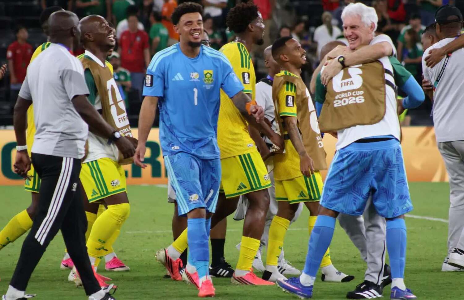 Hugo Broos celebrating with his Bafana Bafana players at the 2026 FIFA World Cup