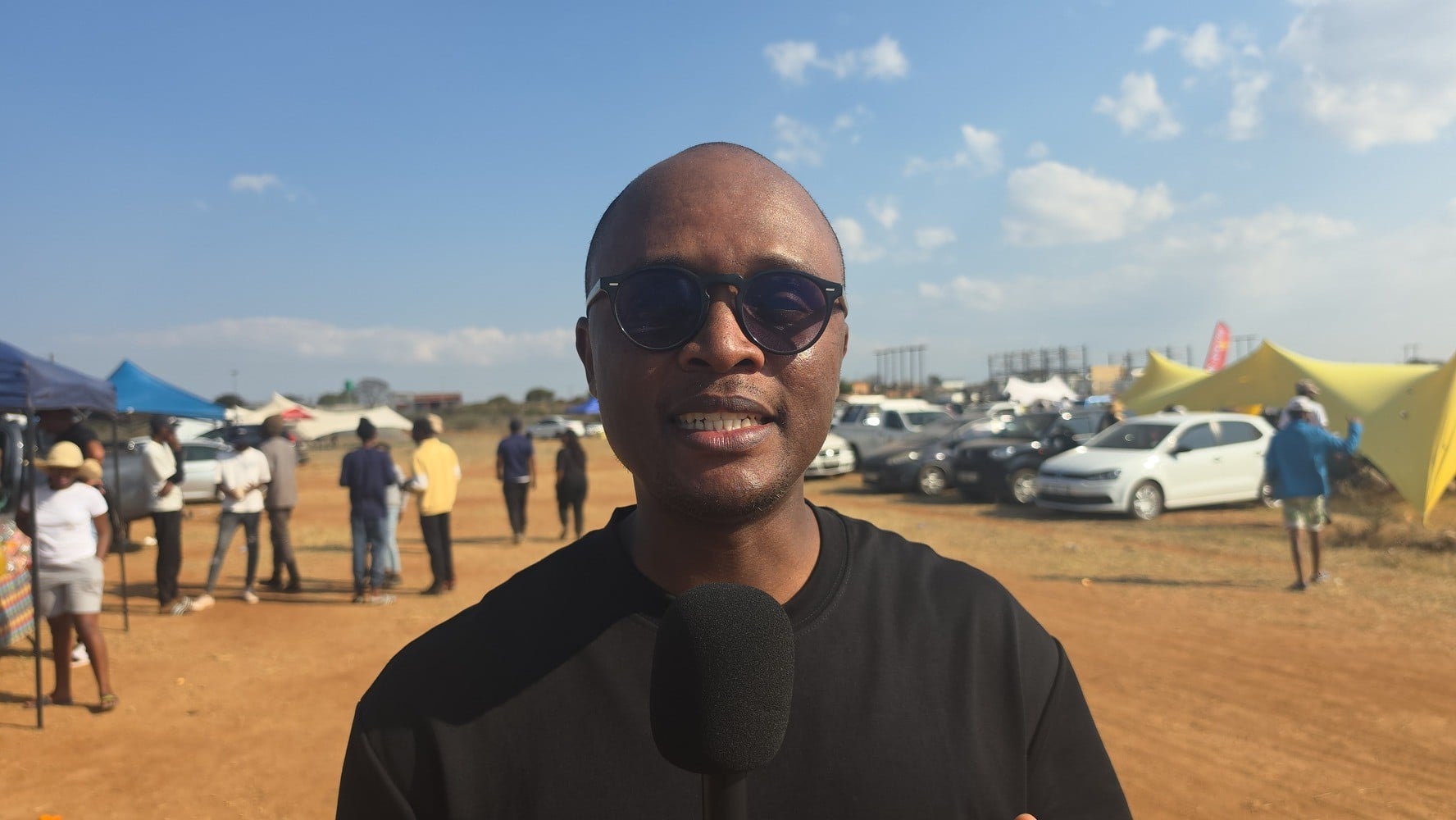 SA Minister of Communications and Digital Technologies Solly Malatsi talking to the media at the SM Legacy football Tournament.