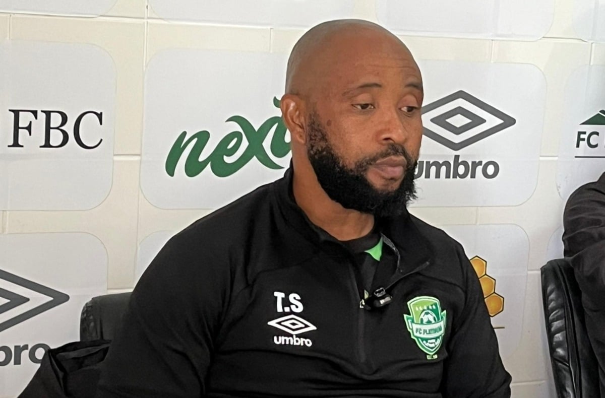 Thabo Senong addressing a press conference